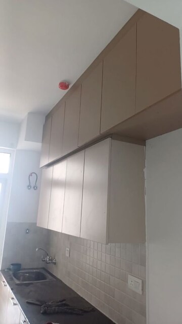 Kitchen in 3.5 BHK Apartment at ATS Homekraft Pious Orchards, Sector 150 – for Rent