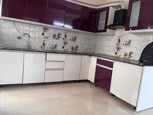 Kitchen in 3 BHK Apartment at Gaur Sportswood, Sector 79 – for Rent