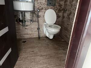 Bathroom in 3 BHK Apartment at Gaur Sportswood, Sector 79 – for Rent