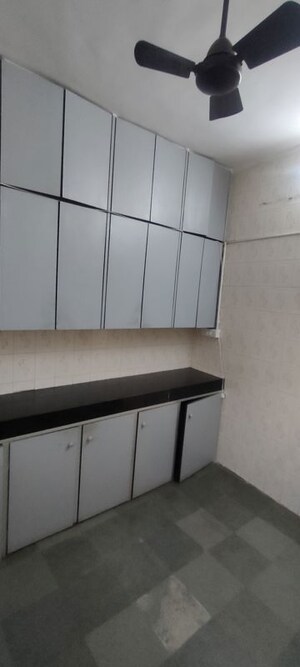 Kitchen in 2 BHK Apartment at Laxmi Krupa Apartment, Borivali West – for Rent