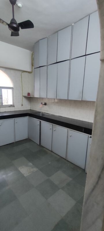 Kitchen in 2 BHK Apartment at Laxmi Krupa Apartment, Borivali West – for Rent