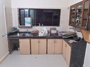 Kitchen in 2 BHK Apartment at Belvalkar Ashirwad, Bhandarkar Road – for Rent