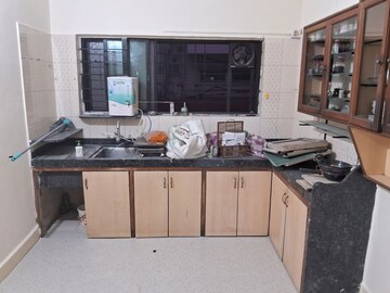 Kitchen in 2 BHK Apartment at Belvalkar Ashirwad, Bhandarkar Road – for Rent