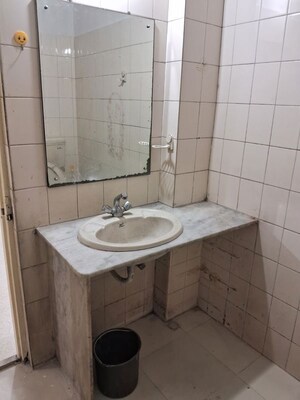 Bathroom in 2 BHK Apartment at Belvalkar Ashirwad, Bhandarkar Road – for Rent