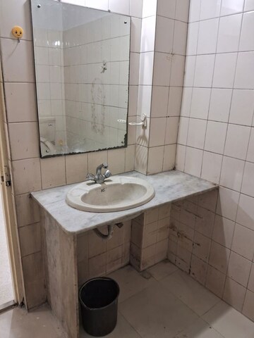 Bathroom in 2 BHK Apartment at Belvalkar Ashirwad, Bhandarkar Road – for Rent