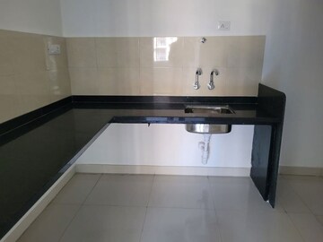 Kitchen in 1 BHK Apartment at Magarpatta City Heliconia, Hadapsar – for Rent
