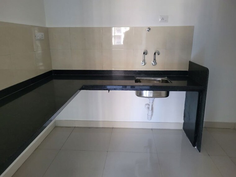 Kitchen, magarpatta-city-heliconia 1 Bedroom 610 Sq.Ft. Apartment In Hadapsar Pune 10086948