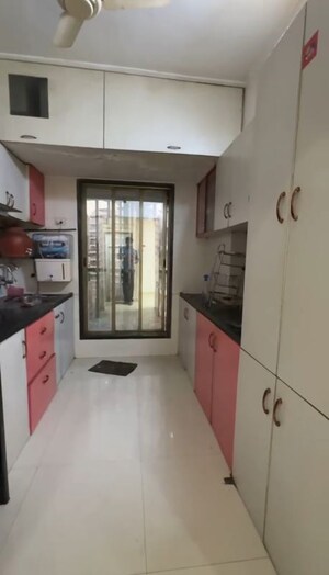 Kitchen in 2 BHK Apartment at Arihant Poonam Garden, Mira Road – for Rent