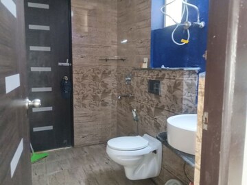 Bathroom in 3 BHK Apartment at Gaur Sportswood, Sector 79 – for Rent