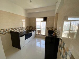 Kitchen in 2 BHK Apartment at Shree Riddhi Siddhi Sumukh Hills, Kandivali East – for Rent