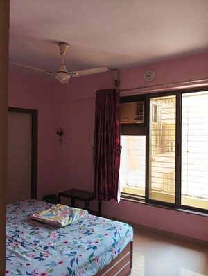 Bedroom in 2 BHK Apartment at Serenity Heights, Malad West – for Rent