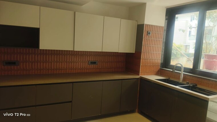 Kitchen, unitech-uniworld-resorts-the-residences 5 Bedroom 6880 Sq.Ft. Villa In Sector 33 Gurgaon 10086725
