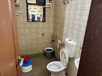 Bathroom in 2 BHK Apartment at Satellite Garden, Goregaon East – for Rent