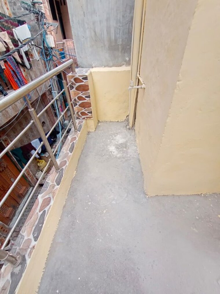 Balcony, burari 1.5 Bedroom 450 Acre Independent House In Burari Delhi 9987047