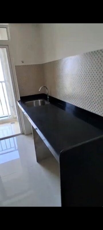 Kitchen in 1 BHK Apartment at Lodha Amara, Kolshet Road – for Rent