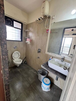Bathroom in 2 BHK Apartment at Om Tropica, Ravet – for Rent