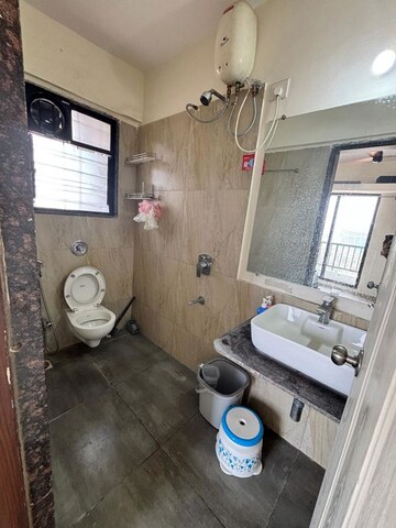 Bathroom in 2 BHK Apartment at Om Tropica, Ravet – for Rent