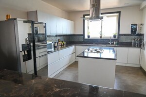 Kitchen in 5 BHK Penthouse at Marvel Zephyr, Kharadi – for Sale