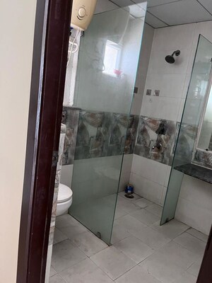 Bathroom in 3.5 BHK Apartment at Gaur Sportswood, Sector 79 – for Rent