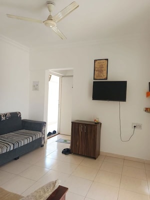 Living Room in 1 BHK Apartment at Pleasant Avenue Apartment, Viman Nagar – for Rent