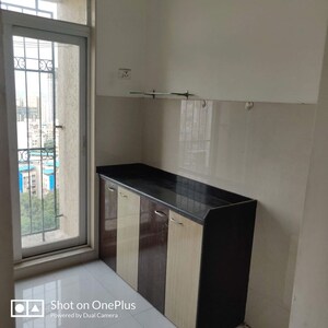 Kitchen in 1 BHK Apartment at Ram Pushpanjali Residency, Owale – for Rent