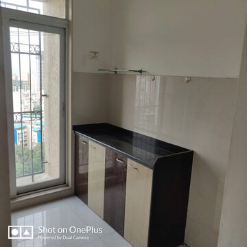 Kitchen in 1 BHK Apartment at Ram Pushpanjali Residency, Owale – for Rent