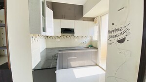 Kitchen in 2 BHK Apartment at Signature Global Orchard Avenue, Sector 93 – for Sale