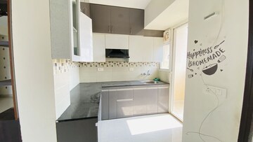 Kitchen in 2 BHK Apartment at Signature Global Orchard Avenue, Sector 93 – for Sale