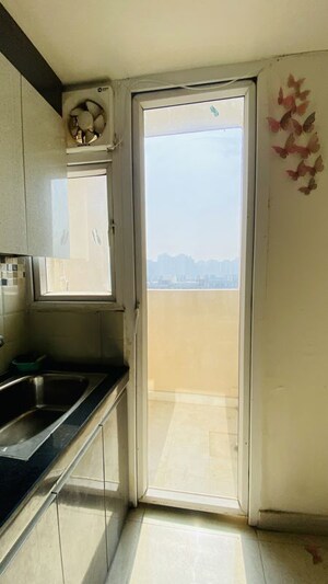 Kitchen in 2 BHK Apartment at Signature Global Orchard Avenue, Sector 93 – for Sale