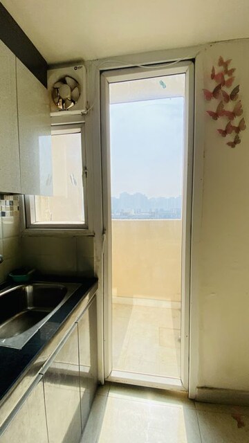 Kitchen in 2 BHK Apartment at Signature Global Orchard Avenue, Sector 93 – for Sale
