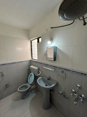 Bathroom in 3 BHK Apartment at Goel Ganga Orchard, Mundhwa – for Rent