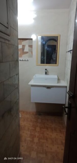 Bathroom in 3 BHK Apartment at Vasant Kunj – for Rent