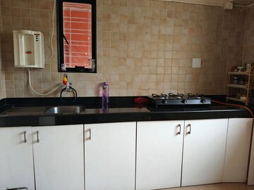 Kitchen in 1 BHK Apartment at Patil Natasha Hill View, Nibm – for Rent