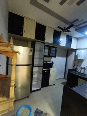 Kitchen in 2 BHK Apartment at Raj Heramba Venkatesh Imperia, Tathawade – for Rent