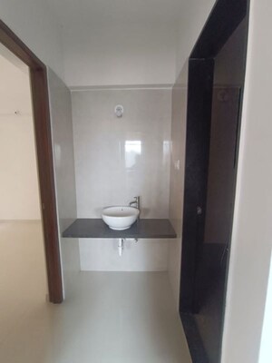 Bathroom in 2 BHK Apartment at Urban Skyline Phase 1, Ravet – for Rent
