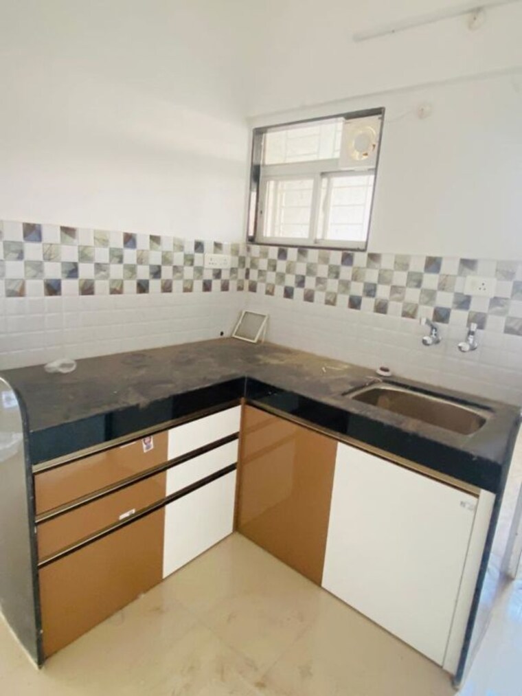 Kitchen, raj-heramba-venkatesh-imperia 2 Bedroom 1100 Sq.Ft. Apartment In Tathawade Pune 10087923