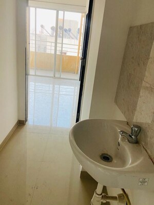 Bathroom in 2 BHK Apartment at Raj Heramba Venkatesh Imperia, Tathawade – for Rent