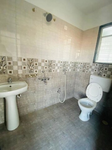 Bathroom in 2 BHK Apartment at Raj Heramba Venkatesh Imperia, Tathawade – for Rent
