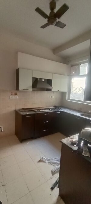 Kitchen in 3 BHK Apartment at Ansal API Esencia, Sector 67 – for Rent