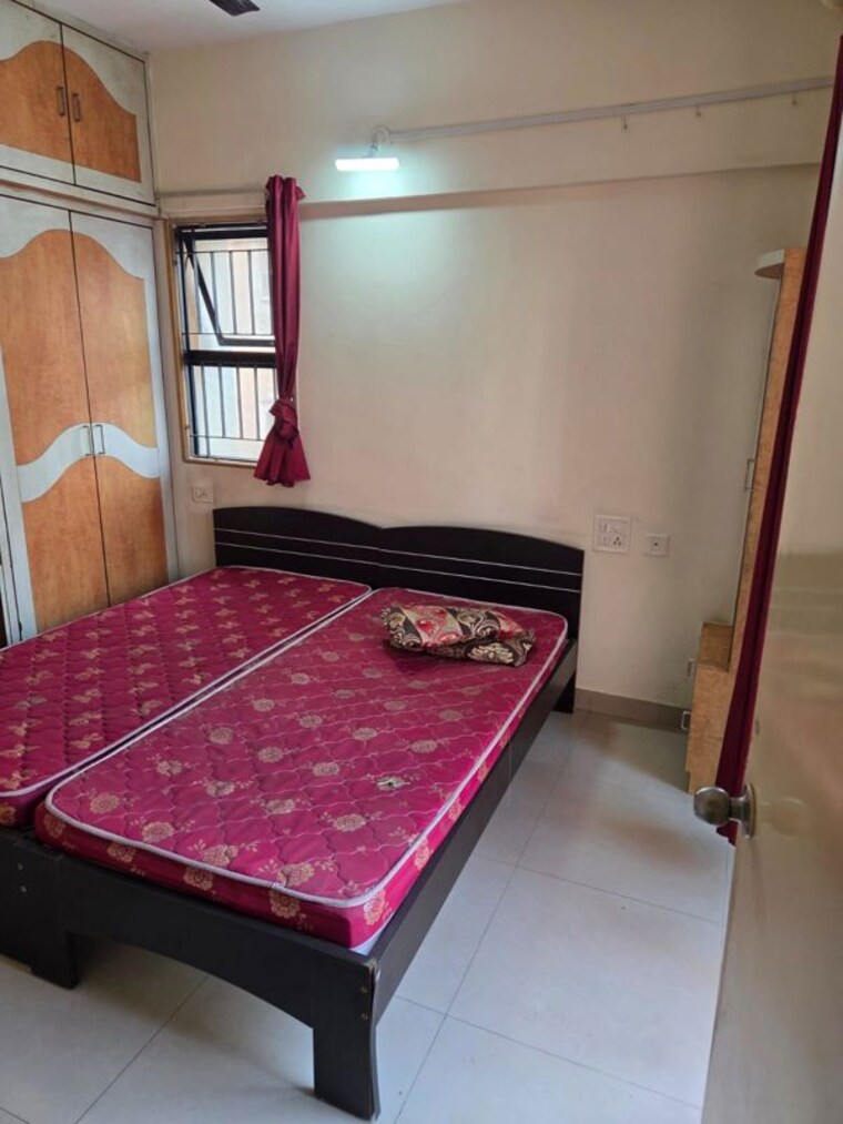 Bedroom, magarpatta-city-heliconia 1 Bedroom 600 Sq.Ft. Apartment In Hadapsar Pune 10087972