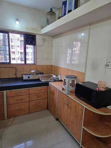 Kitchen in 1 BHK Apartment at Magarpatta City Heliconia, Hadapsar – for Rent