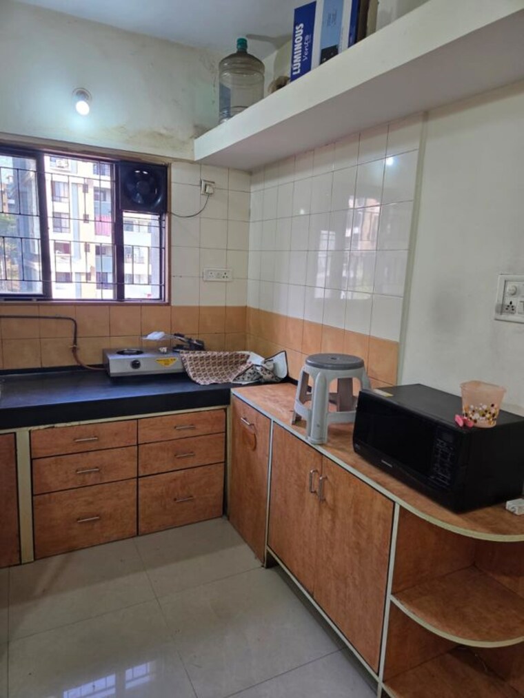 Kitchen, magarpatta-city-heliconia 1 Bedroom 600 Sq.Ft. Apartment In Hadapsar Pune 10087972