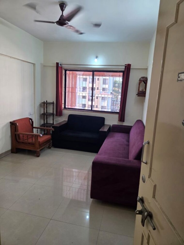 Living Room, magarpatta-city-heliconia 1 Bedroom 600 Sq.Ft. Apartment In Hadapsar Pune 10087972