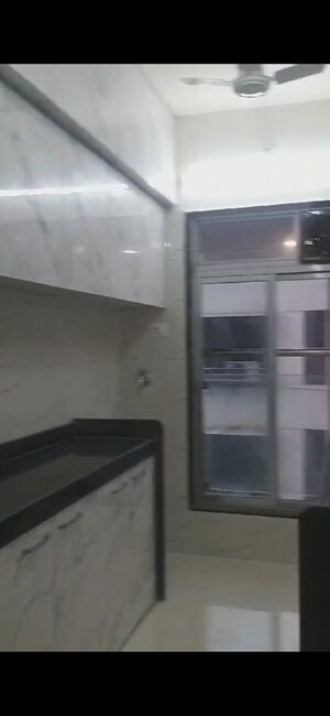 Kitchen in 2 BHK Apartment at Umang Shastri Nagar West View CHS, Goregaon West – for Rent