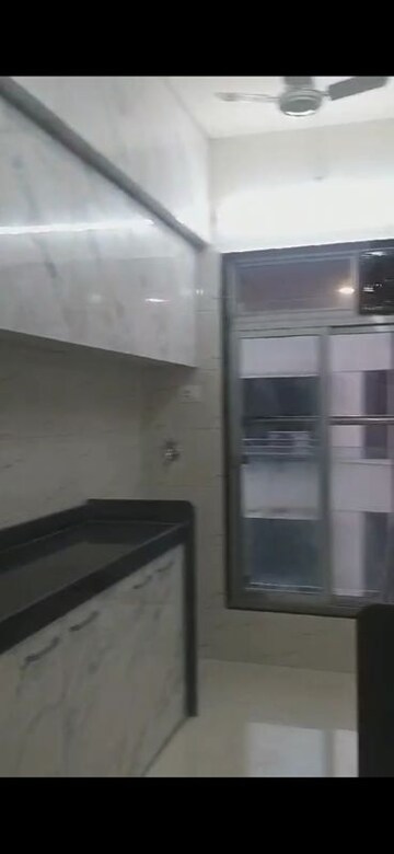 Kitchen in 2 BHK Apartment at Umang Shastri Nagar West View CHS, Goregaon West – for Rent