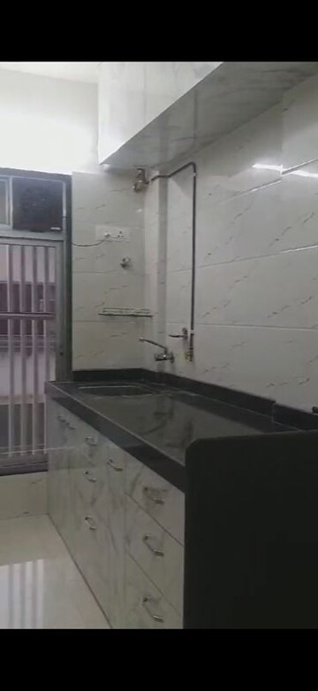 Kitchen in 2 BHK Apartment at Umang Shastri Nagar West View CHS, Goregaon West – for Rent