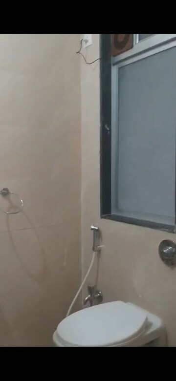 Bathroom in 2 BHK Apartment at Umang Shastri Nagar West View CHS, Goregaon West – for Rent
