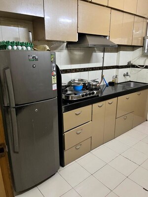 Kitchen in 2 BHK Apartment at Madhurima CHS, Andheri West – for Rent