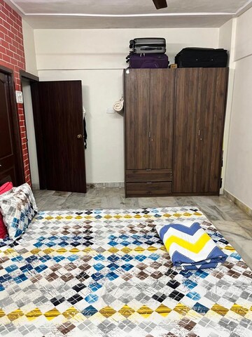 Bedroom in 2 BHK Apartment at Madhurima CHS, Andheri West – for Rent