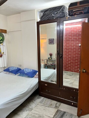 Bedroom in 2 BHK Apartment at Madhurima CHS, Andheri West – for Rent